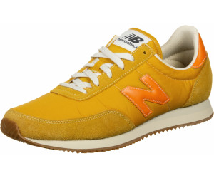 new balance 574 varsity gold with mako blue