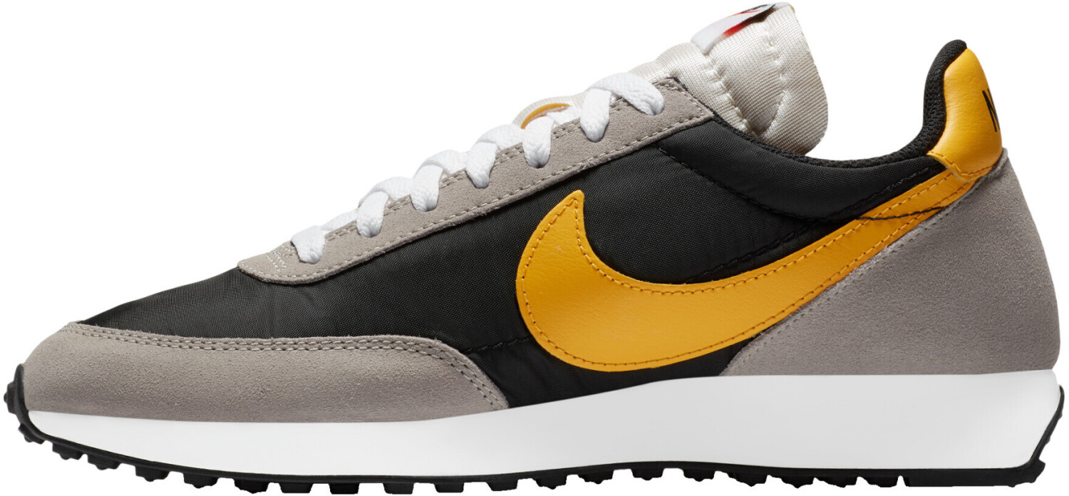 nike tailwind 79 gold