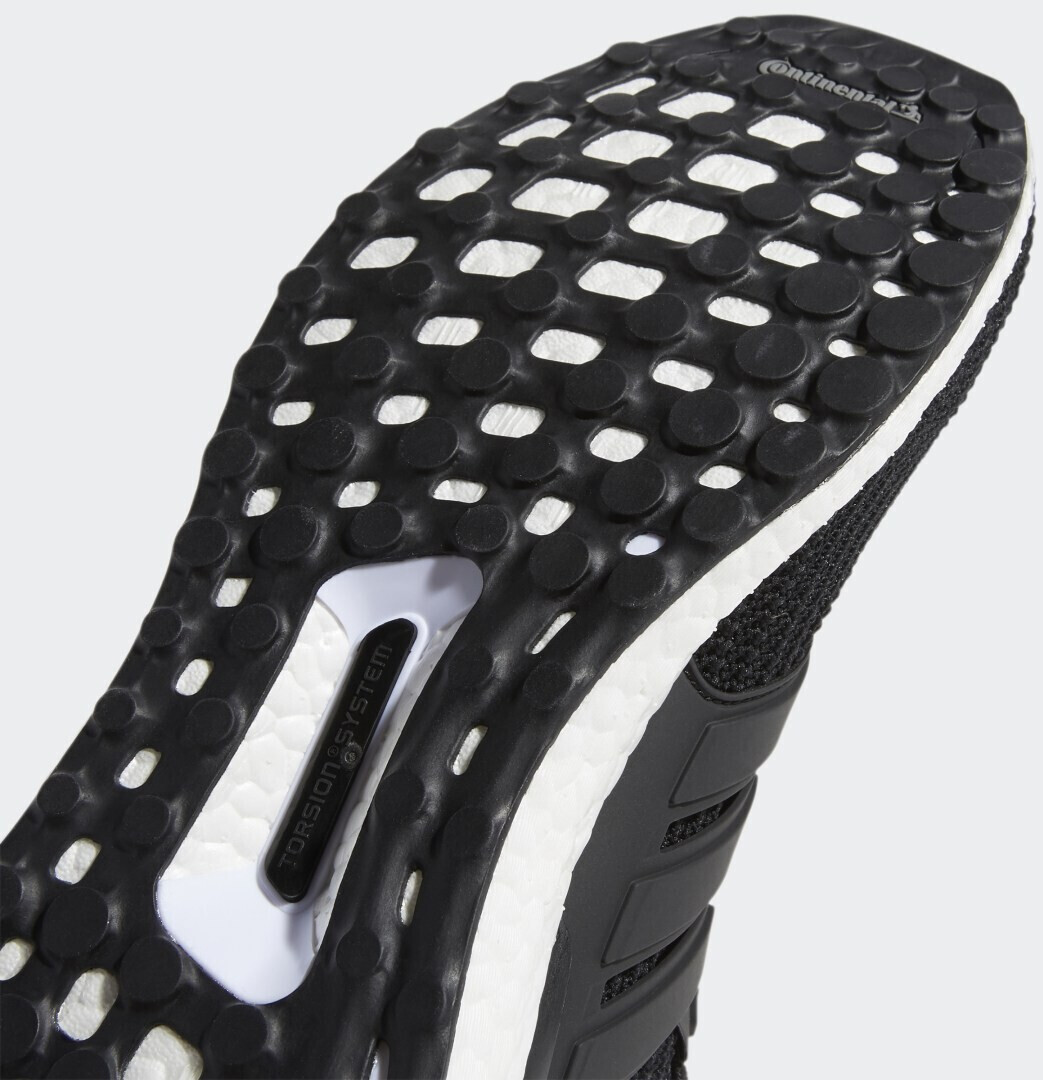 White ultra boost clearance with black sole