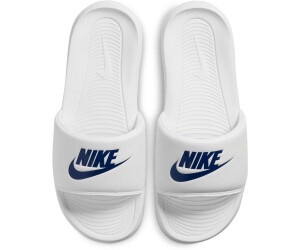 Nike white store flip flops