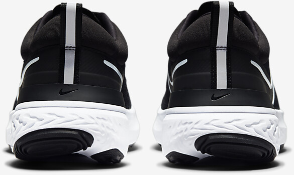 womens black and white nike react