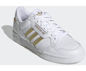 White with gold stripes adidas shop