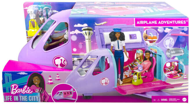 l'avion bleu vintage de barbie, avec la Barbie commandant de bord et sa  valise, et d'autres jouets, canettes, valis…