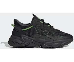 Buy Adidas Ozweego Kids core black core black solar green from