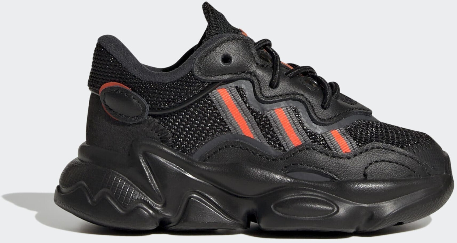 Buy Adidas Ozweego Kids core black solar red grey six from 24.99