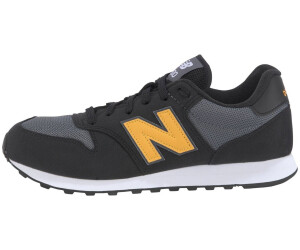 New balance 500 black and gold top