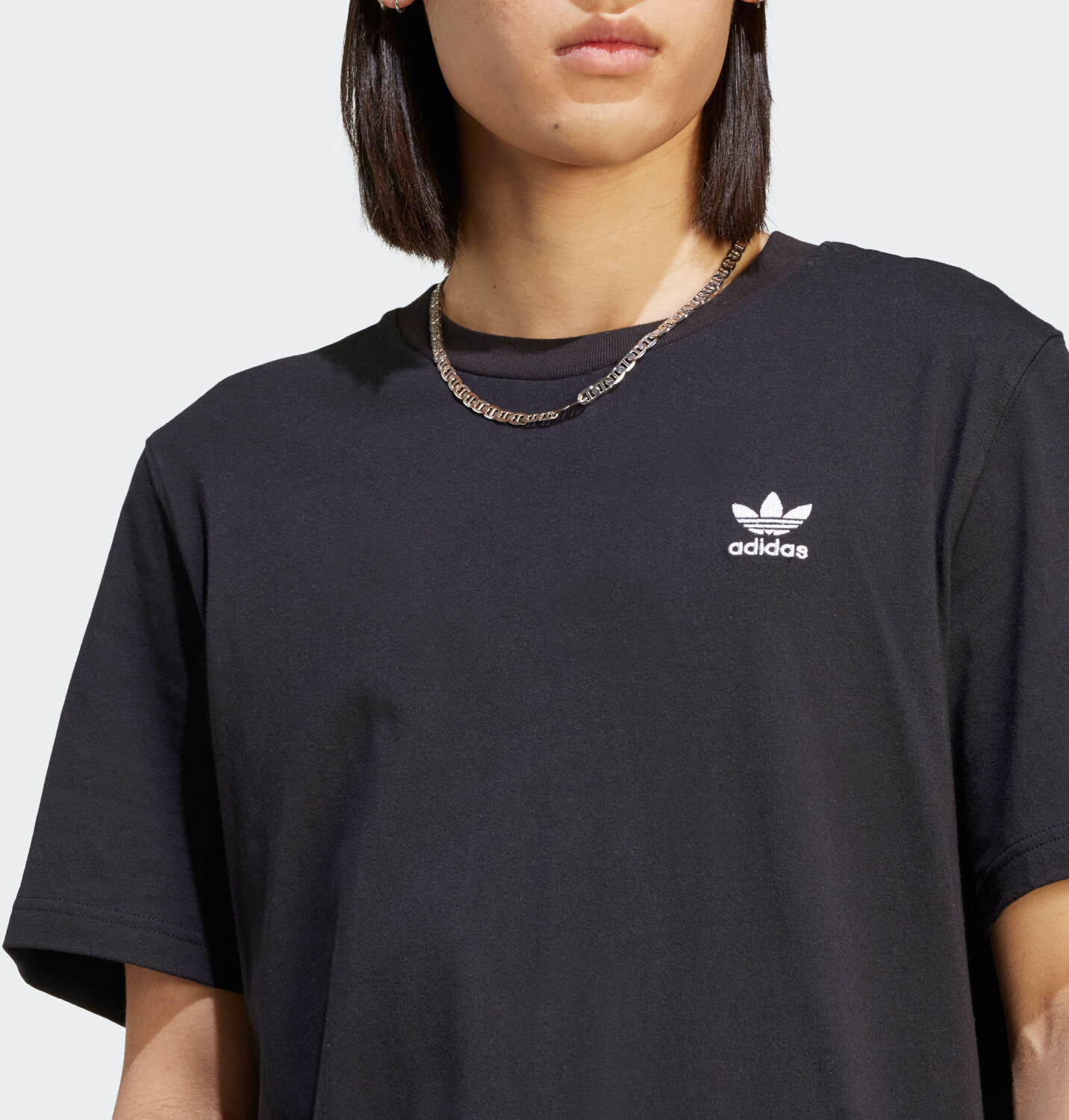 White adidas t shirt with black logo discount