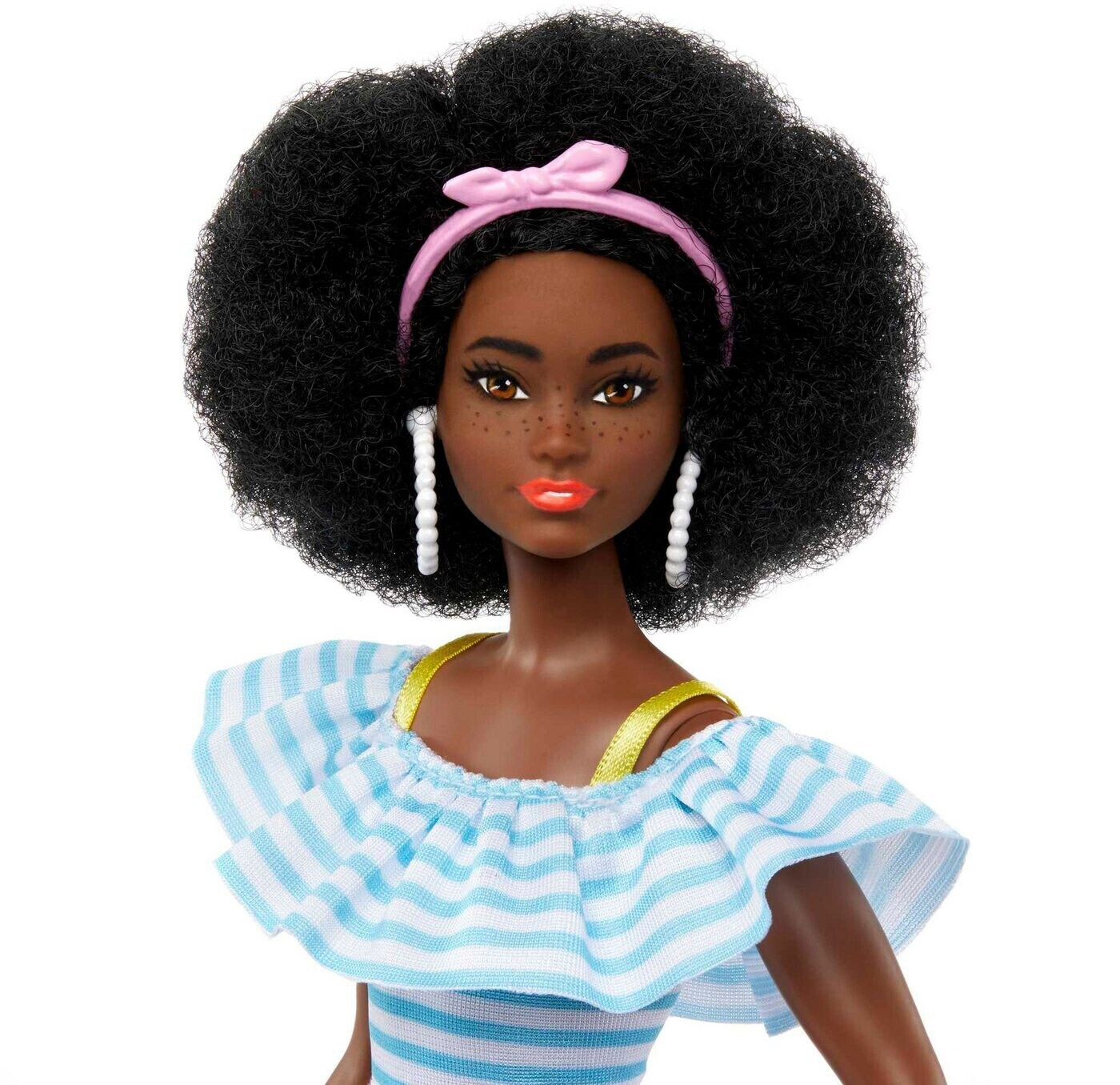 Barbie doll with new arrivals afro