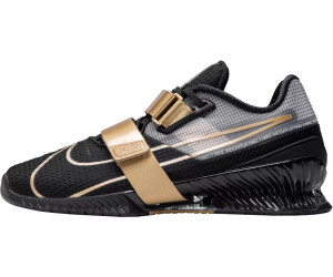 Nike gold 2024 and black sneakers