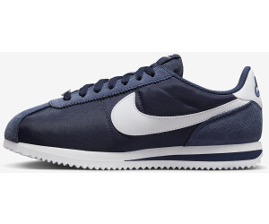 Navy blue and white cortez shop