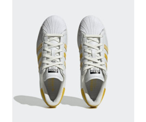 Superstar adidas amarillas new arrivals