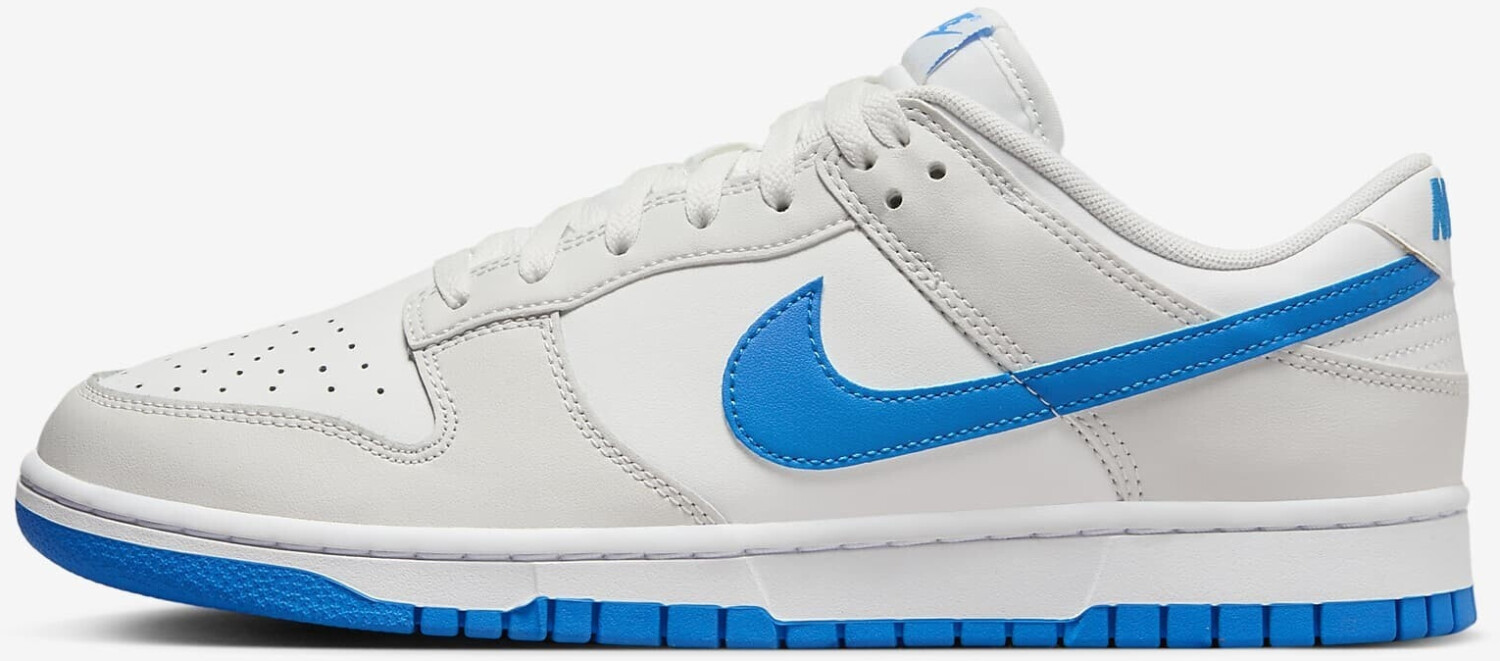 White nikes with blue swoosh store
