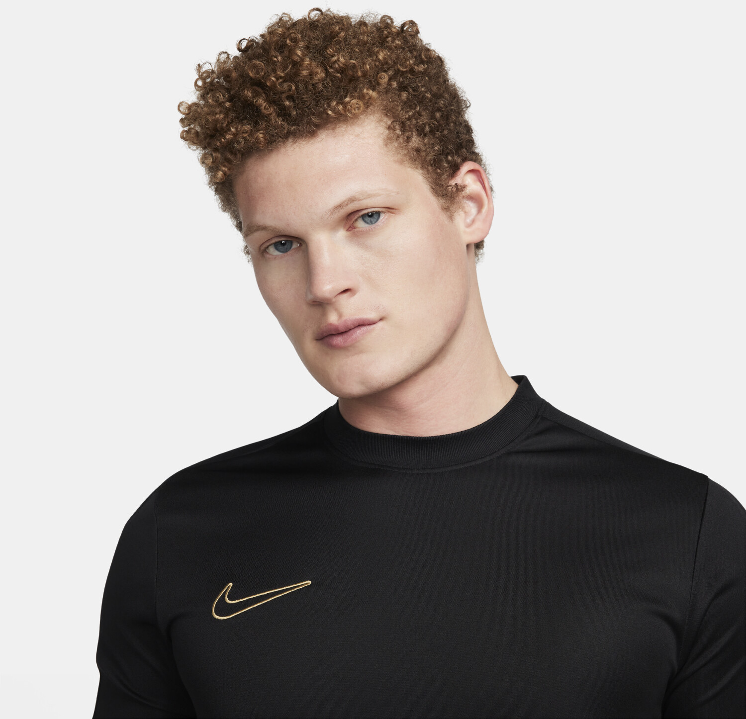 Black and metallic gold nike shirt discount