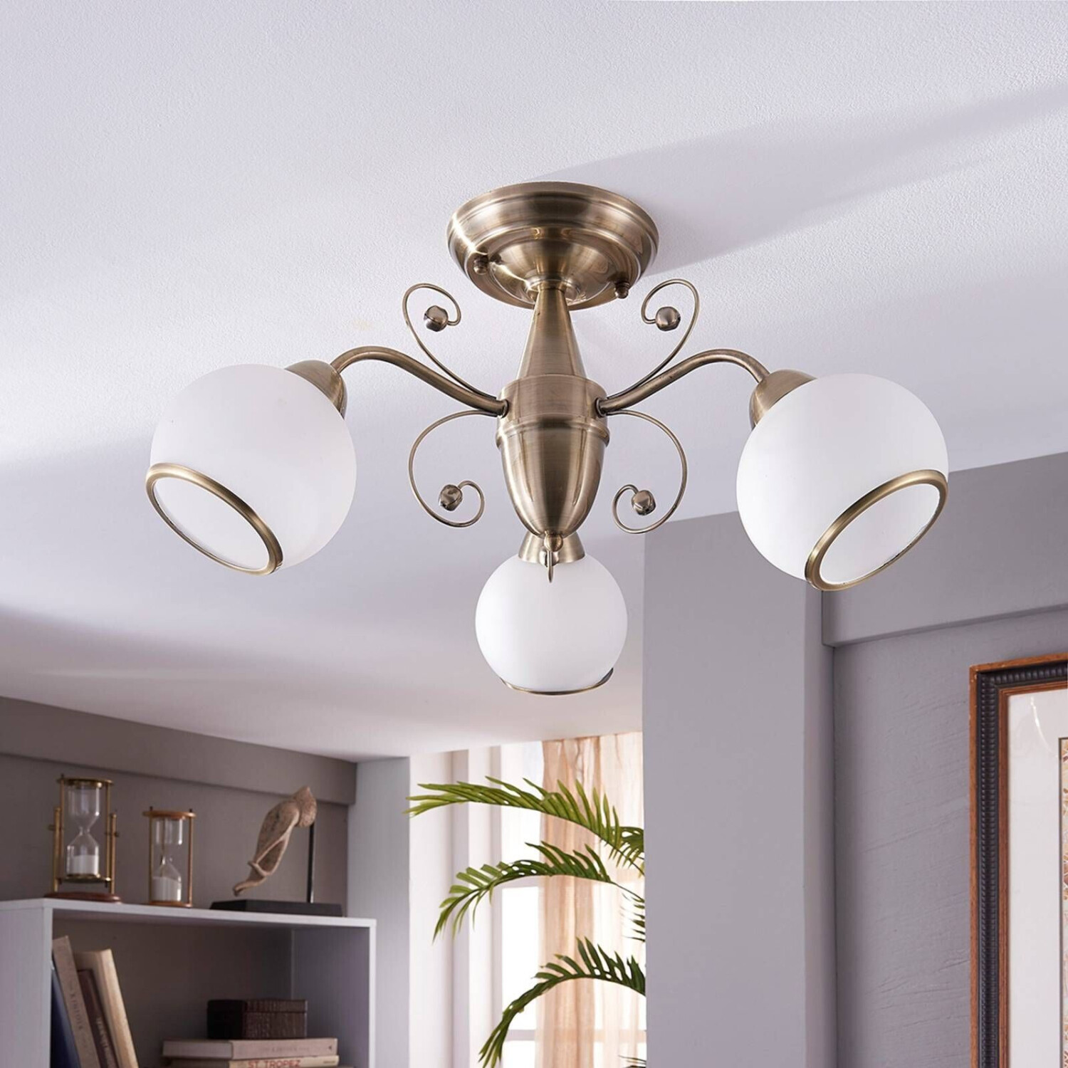 Lindby Corentin 3-bulb ceiling light in old brass