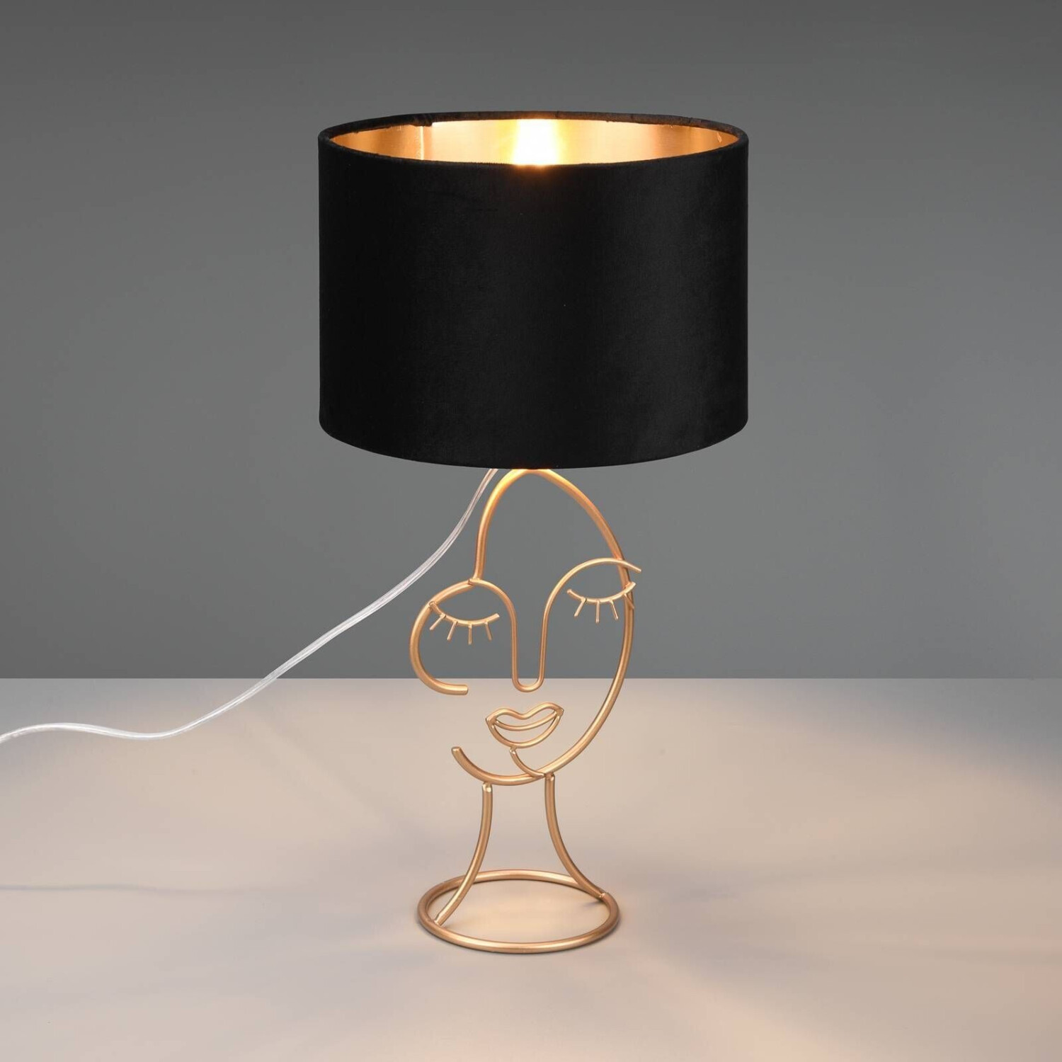 Trio Mary table lamp with face design, black/gold