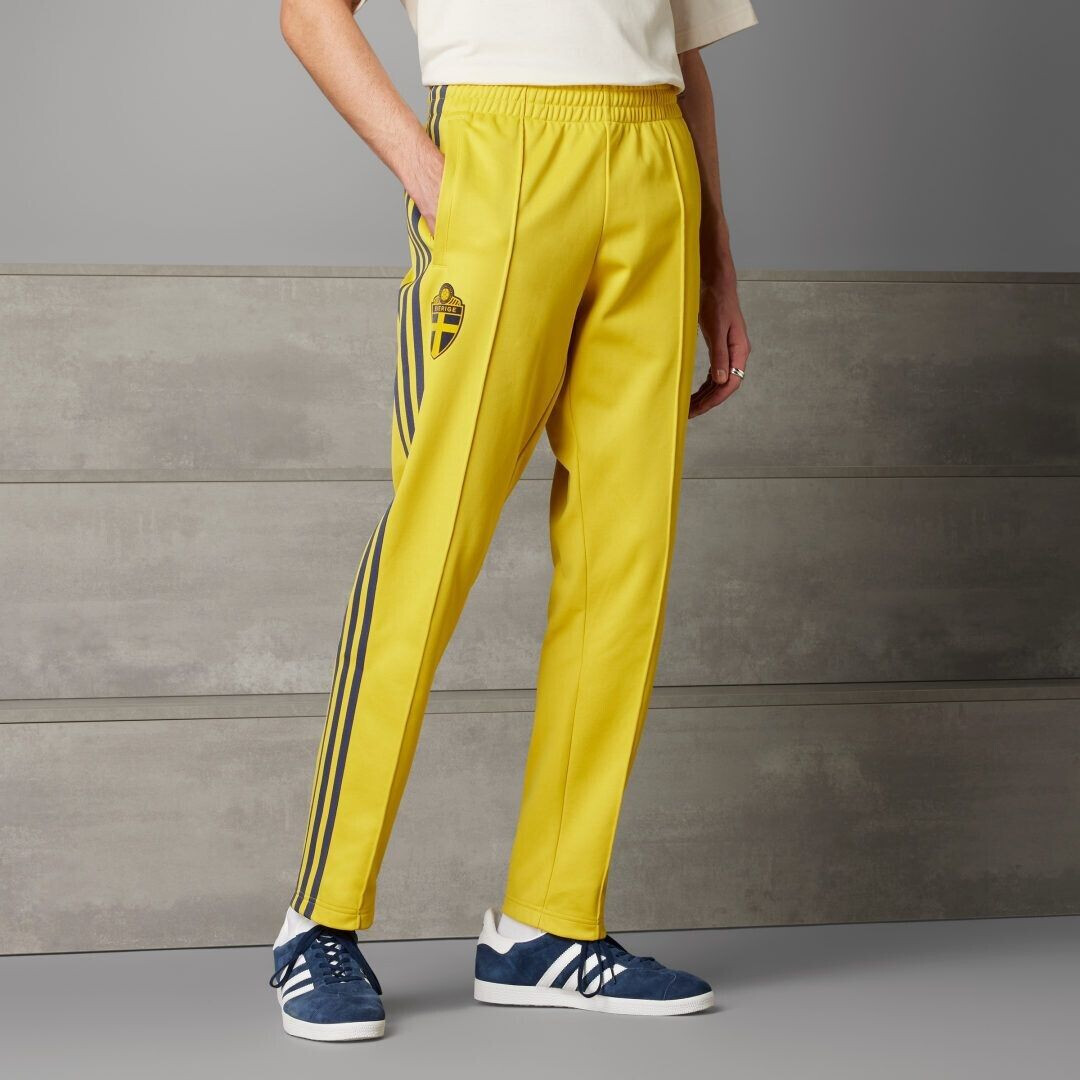 Black and yellow adidas track pants outlet