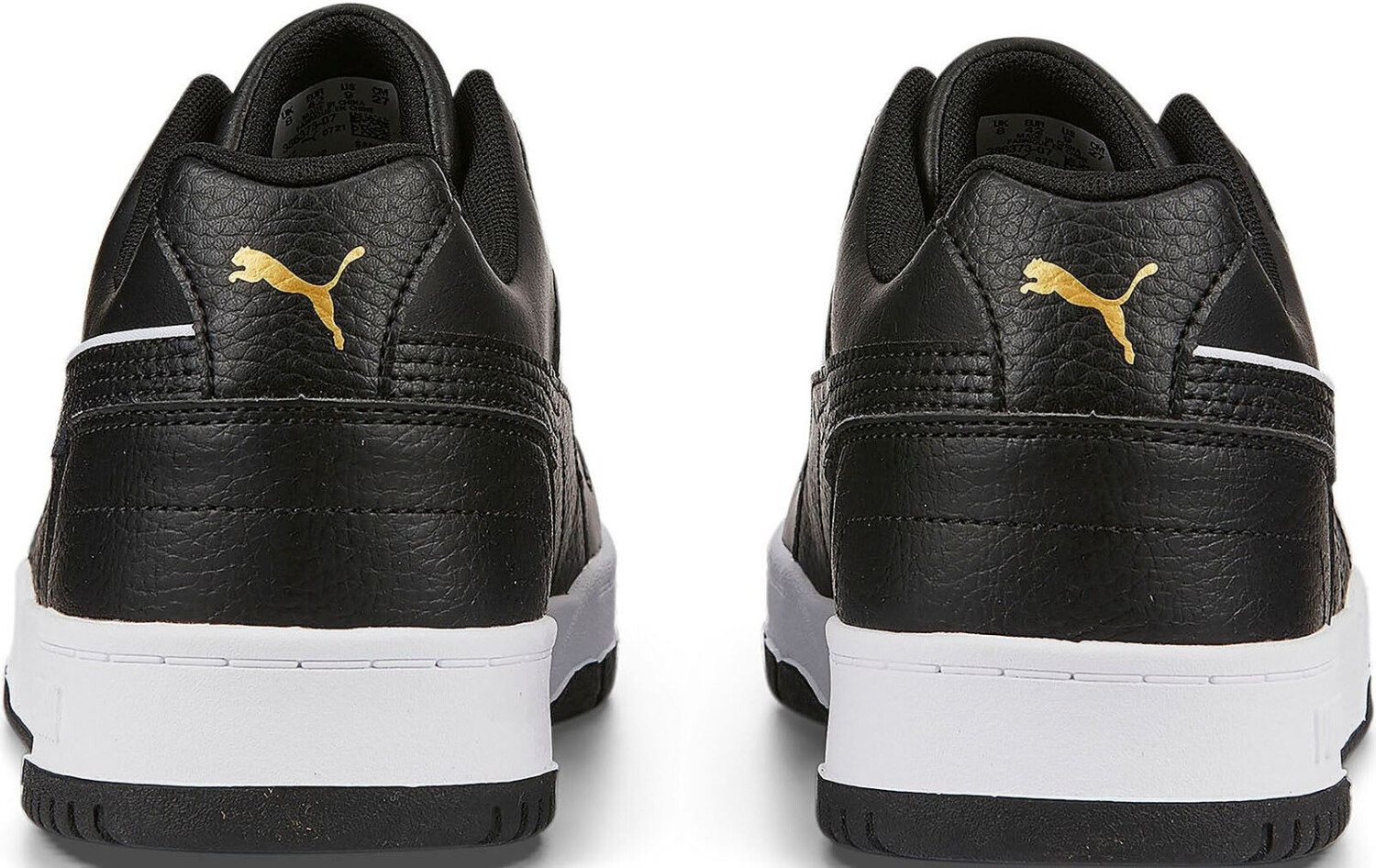 Black white and gold pumas shop