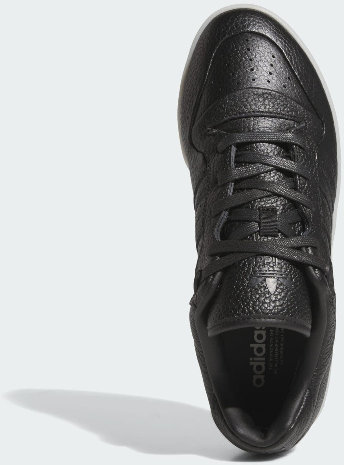 Adidas originals rivalry low sneakers in triple black shop