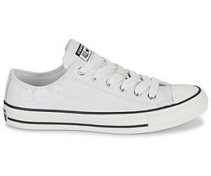 White chucks with black line top