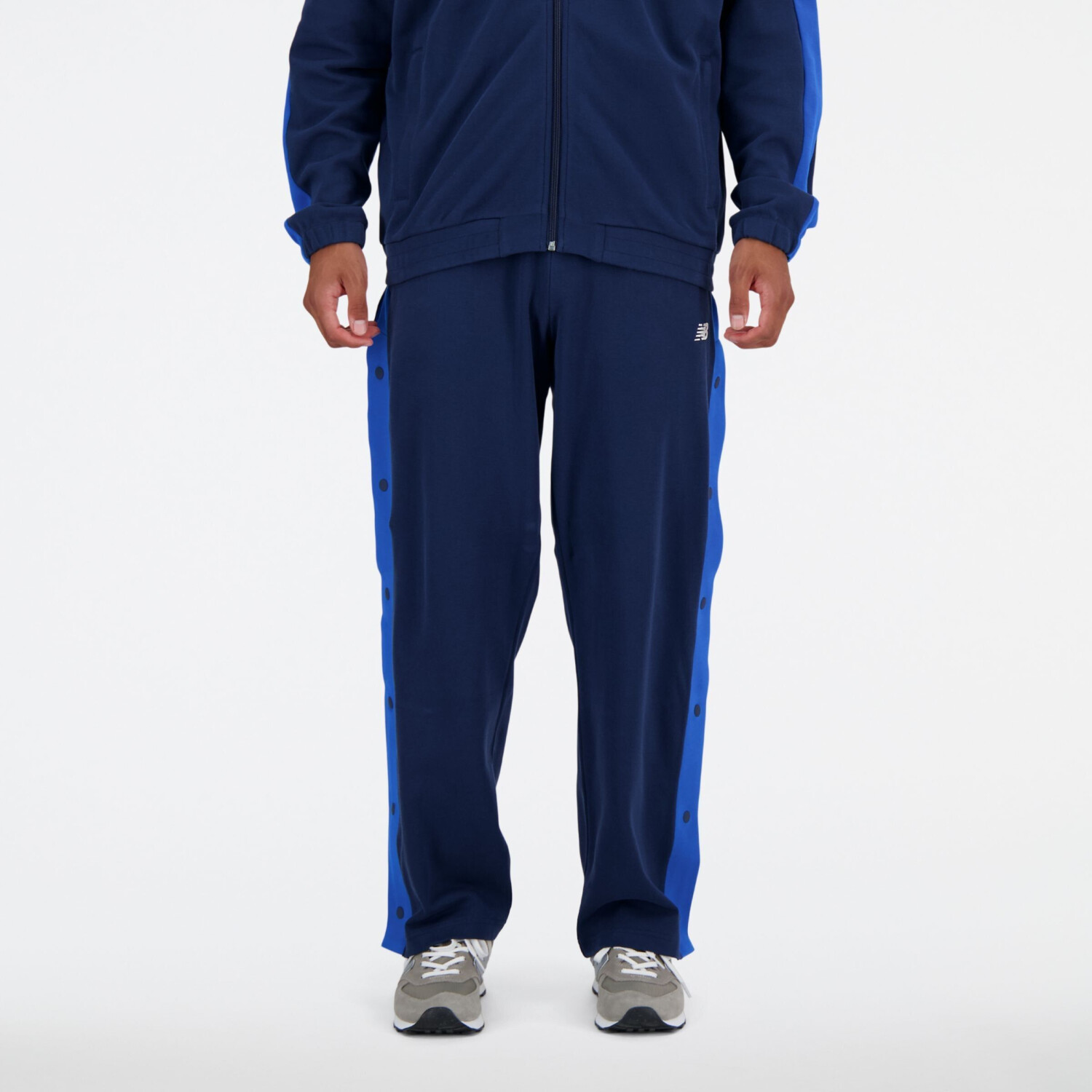 New Balance Sportswear's Greatest Hits Snap Pant blue poly knit MP41504NNY