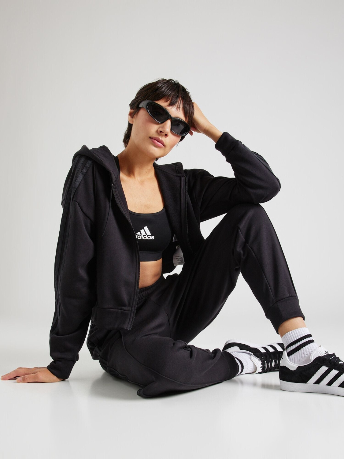 Black adidas tracksuit womens 2025