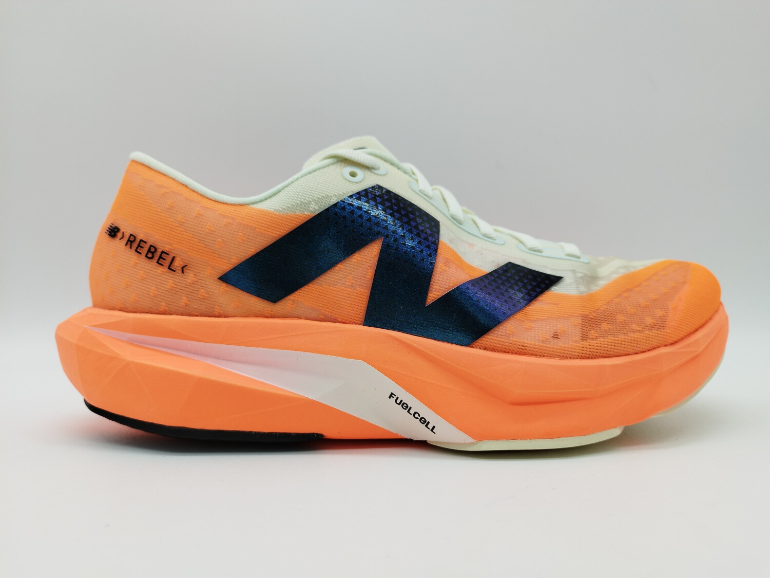 New Balance FuelCell Rebel v4 (MFCXCO4) hot mango with angora and black