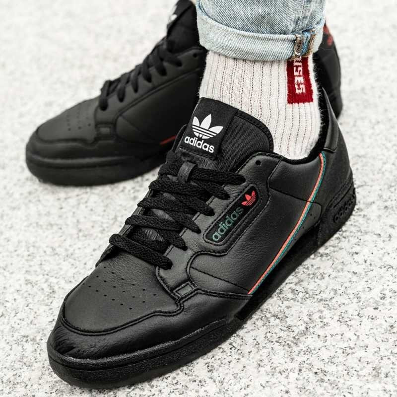 Adidas continental negras hombre top