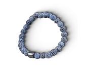 Witte armband met goudkleurige witte steentjes hanger